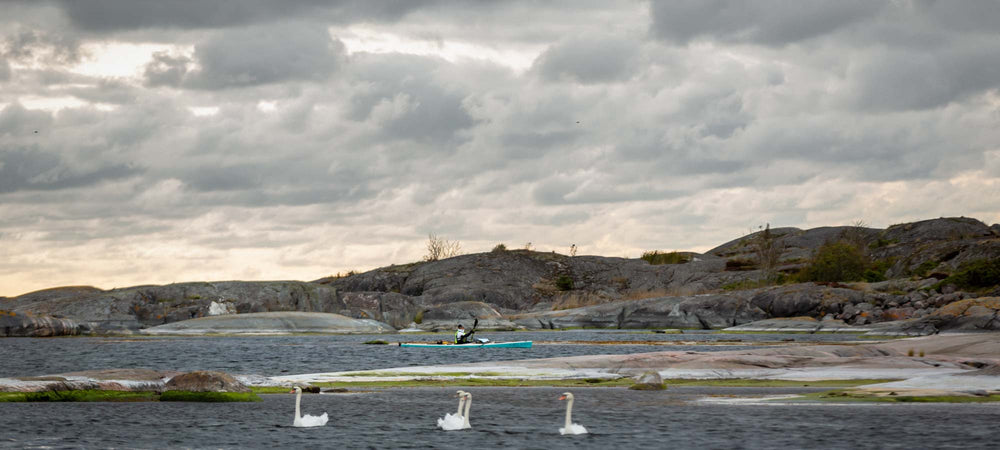 Person paddling in the kayak Melker Ulvön in Stockholms archipelago